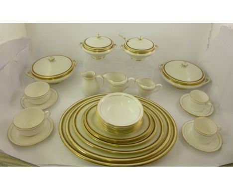 A PART ROYAL WORCESTER SERVICE white ground with gilt line comprising; cups, saucers, jug, together with similar "Coronation 
