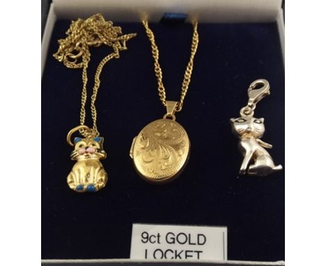 A 9CT GOLD AND ENAMEL PENDANT fashioned as a seated cat on chain, a 9ct LOCKET fashioned as a seated cat on chain, and a silv