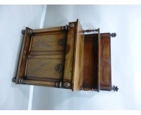 A 19TH CENTURY REGENCY DESIGN MAHOGANY CHIFFONIER having panelled back with carved Prince of Wales finials, with shelf over b