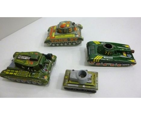 FOUR VINTAGE CLOCKWORK TIN-PLATE ARMY TANKS, German and Japanese 