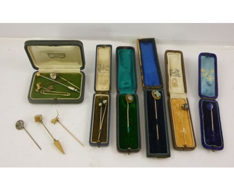 A SELECTION OF FOURTEEN GEM SET AND PASTE GOLD COLOURED METAL MOUNTED TIE PINS, two set opals, one turquoise and diamante 