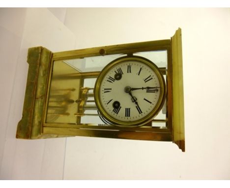 A 20TH CENTURY FRENCH GILT BRASS AND GREEN ONYX MANTEL CLOCK, having four glass case, 8-day Japy type mechanism with gong str