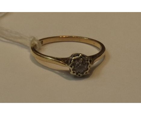 A DIAMOND ILLUSION SET SOLITAIRE in 9ct gold setting, Birmingham assay, size R 