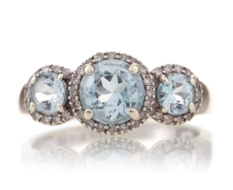 AQUAMARINE AND DIAMOND RING set with three round aquamarines within diamond halos, in nine carat white gold, size M, 2.9gWorn