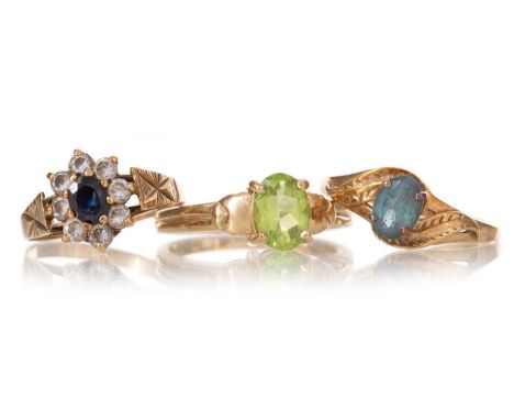 TWO GEM SET SOLITAIRE RINGS ALONG WITH A GEM SET CLUSTER RING each in nine carat gold, 6.5g gross (3)