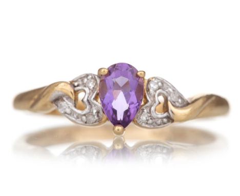 AMETHYST AND DIAMOND RING set with a pear shaped amethyst flanked by small diamonds, in nine carat gold, size OGenerally worn