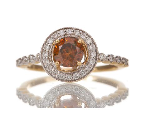 TREATED ORANGE DIAMOND RING set with a treated diamond within a halo of colourless diamonds, on diamond shoulders, marked 18K