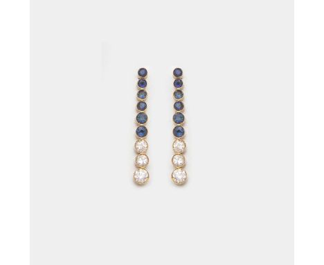 Gelbgold, gest. 750. Linear besetzt mit kornblumenblauen Saphiren von zus. ca. 0,80 ct. und Brillanten von zus. ca. 0,80 ct.,