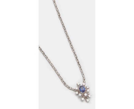 Weißgold, 18 ct.; Zentral besetzt mit einem royalblauem Saphir von ca. 1,60 ct. im Ovalschliff, stufenartig umrahmt mit Brill