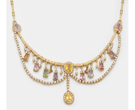 Gelbgold, gest. 750. Schauseitig besetzt mit Diamanten von zus. ca. 3,11 ct. und Saphiren in den Farben, Grün, Gelb, Pink und