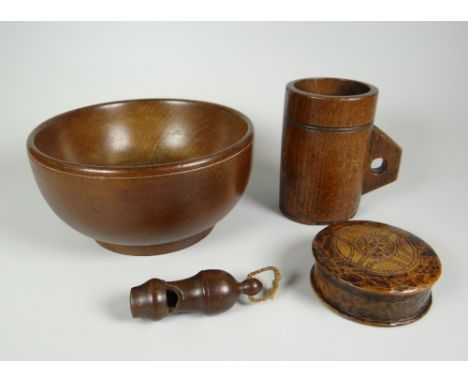 A PARCEL OF WELSH TREEN comprising cawl bowl, 15cms diam, treen whistle, cylindrical grain measure with angular handle and a 