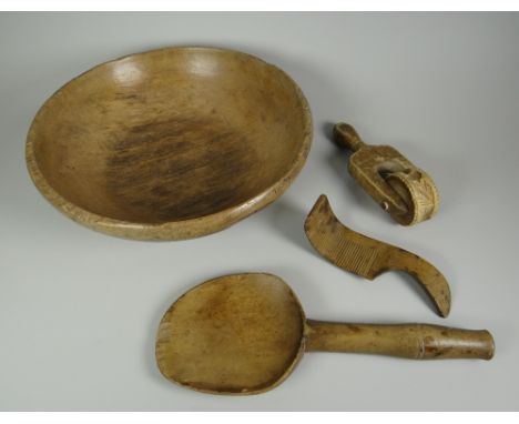 A PARCEL OF WELSH FARMHOUSE TREEN comprising small dairy-bowl, 26cms diam, butter-paddler, butter roller-marker and treen but