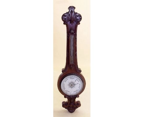 A Victorian mahogany mercury barometer/thermometer with carved decoration