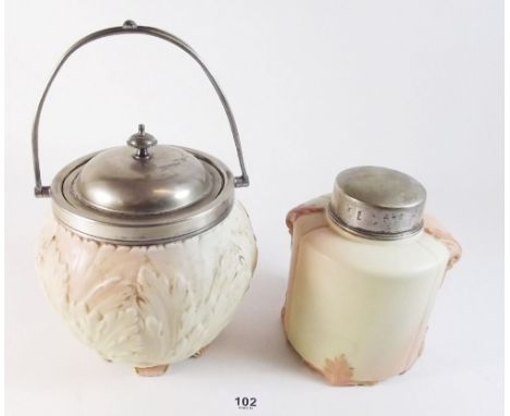 A Locke and Co ivory blush biscuit jar with silver plated lid and a similar tea caddy