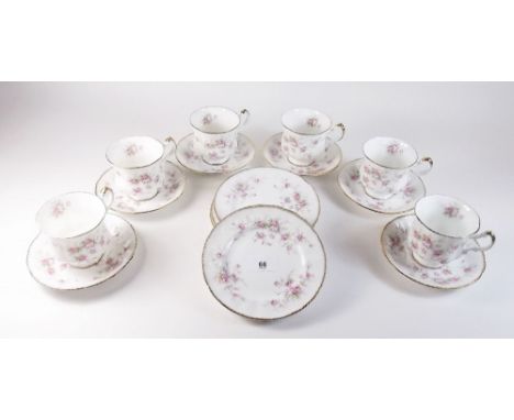 A Paragon 'Victoriana Rose' tea service comprising six cups and saucers and six tea plates