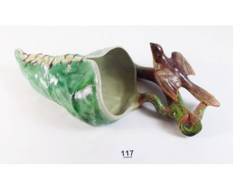 A Royal Worcester Majolica leaf form wall pocket with bird