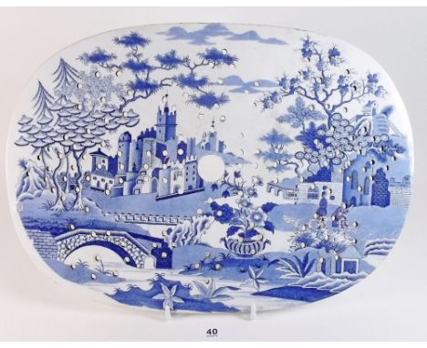 A Spode blue and white transfer print pearly ware drainer 'Gothic Castle' pattern c.1820.