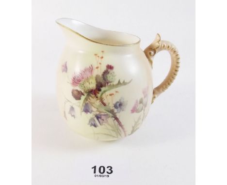 A Royal Worcester ivory blush jug painted thistle