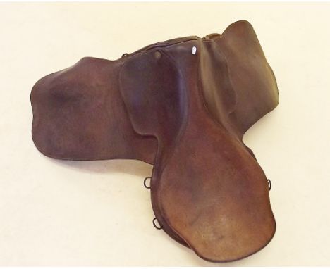 A vintage English leather hunting saddle