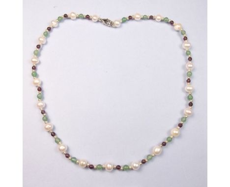 A freshwater pearl and green stone necklace