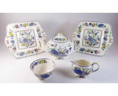 A Masons Regency Ironstone tea service comprising: two bread and butter plates, fifteen tea plates, eighteen cups and saucers