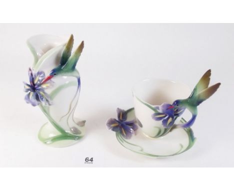 A Franz humming bird candlestick and cabinet cup and saucer