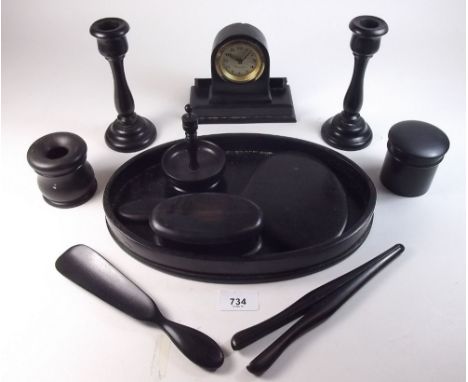 An ebony dressing table set including alarm clock