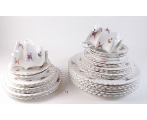 A Richmond dinner and tea service printed rosebuds 'Rose Time' comprising: four cups and six saucers, six tea plates, six sid