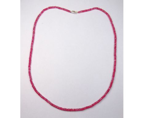 A faceted ruby bead necklace