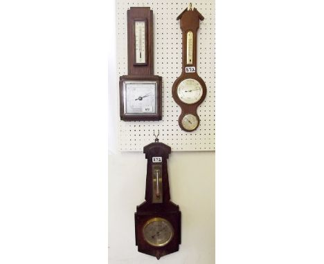 Three barometer/thermometers
