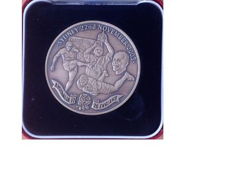 2003 England Rugby World Cup commemorative medal in nice red presentation box. his unique Limited Edition memento has been ma