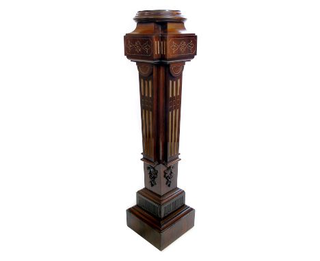 Early 19th century rosewood veneered aesthetic design pedestal, turned dish top above square section tapering column with ste