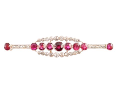 Edwardian ruby and diamond cluster bar brooch , the central bar containing a total of 9 round old Swiss cut rubies, total rub