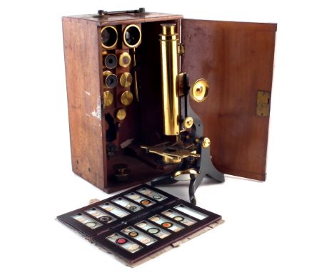 Swift &amp; Son, Tottenham Court Road, London, lacquered brass and blued steel monocular microscope with a selection of acces