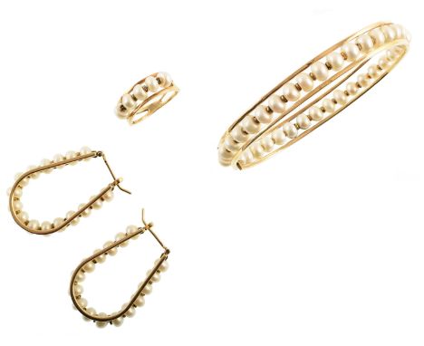 A suite of three 14ct gold and cultured pearl set of jewellery comprising a hinged wirework bangle, a pair of horseshoe drop 