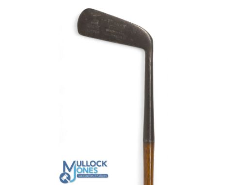 R Forgan giraffe putter showing the green and flag mark, stamped Gold Medal, with 6" hosel fitted with a full length leather 