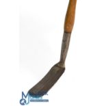 Holtzapffel elongated sharp bladed practice club showing the stamp mark to the hosel and fitted with