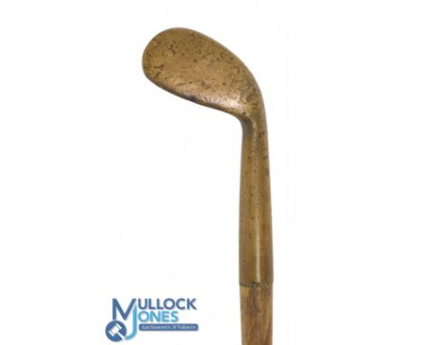 Golf Sunday Walking Stick with a smooth faced rut niblick handle, brass tip, measures 32" in length approx.