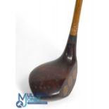 James Sherlock weighted training club in the shape of a brown stained socket neck wood stamped R H