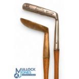 2x Interesting putters features a very shallow elongated broad head metal blade showing the Spalding
