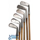 6x Assorted Tom Stewart irons features a no 2 iron for Alex Philips, no 3 iron stamped A Crook,
