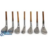 7x Assorted Alloy mallet head putters including a good Braid Mills model for Robinson and Co