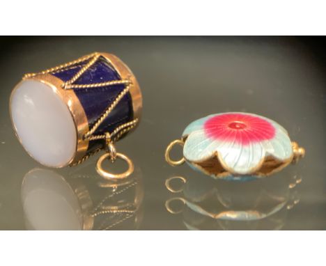 An enamel and mother of pearl mounted drum pendant, vibrant cobalt blue body, mother of pearl end cap, unmarked yellow metal 