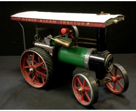 A Mamod TE1A Live Steam engine, green body, white canopy, rubber tracked rear wheels. 