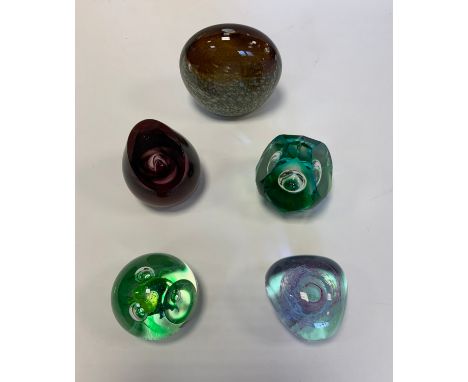 Glass paperweights - a Caithness glass paperweight, ‘Reincarnation’, in green glass, limited edition number 36/50, 9.5cm high