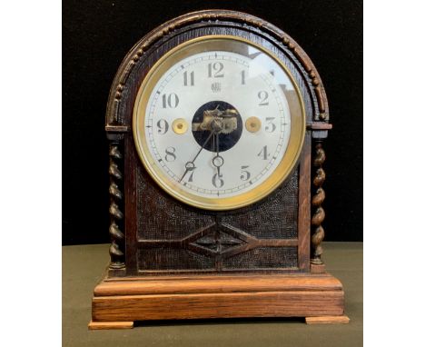 An Edwardian/early 20th century oak cased Bulle patent early electric domed mantel clock timepiece, silver dial, Arabic numer