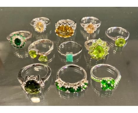 A 925 silver peridot dress ring, others Citrine, Chrome Diopside, Emerald etc, part marked TGGC 925, one with Gemporia card, 