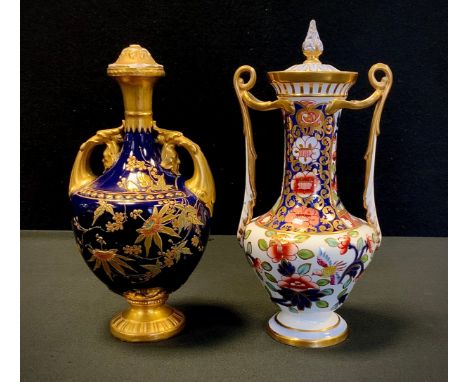 A Copeland Spode Imari patterned twin handled vase, 22cm high; Royal Worcester blue and gilt twin handled vase, 20cm (2) 