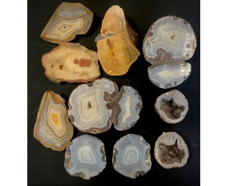 Geological interest - a halved Agate Geode, Druzy crystal centre, each half measuring 17cm x 13cm;  another, smaller halved a