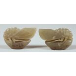 TWO CHINESE CARVED CICADA FORM JADE SEALS, each with incised inscriptions to the base, 7.5cm long.